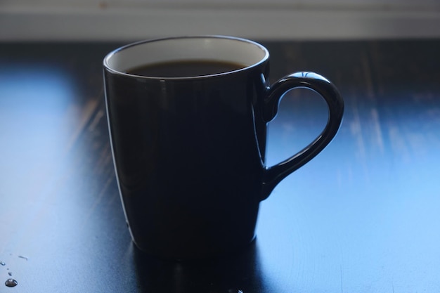 reflection of sunlight on coffee mug
