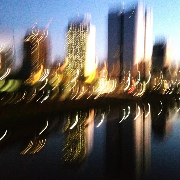 Photo reflection of trees in water