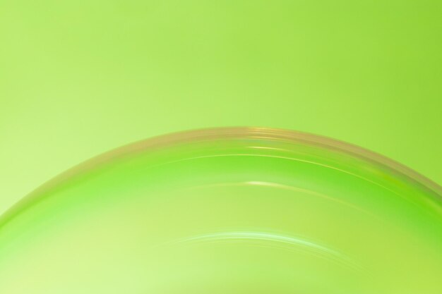 reflections in a green soap bubble