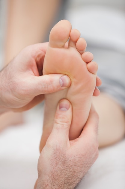 Reflexology massage being made