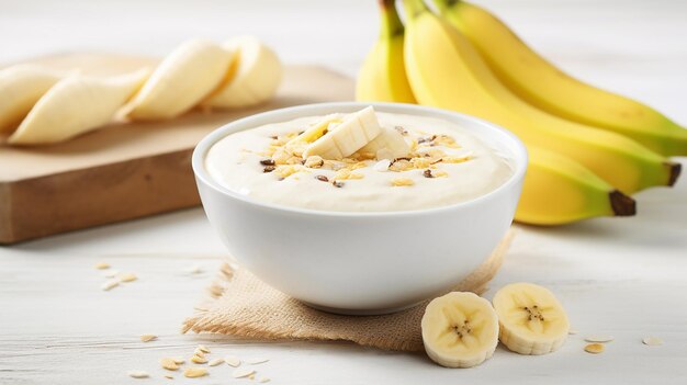 Photo refreshing banana smoothie in a bowl on a white background fresh fruit breakfast drink