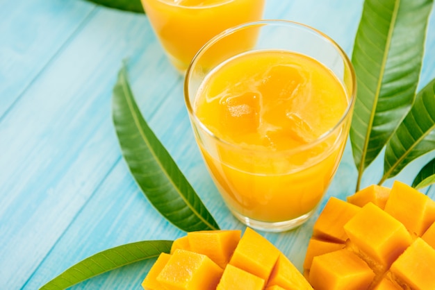 Refreshing cold mango juice drinks for summer