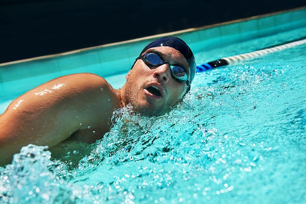 Refreshing exercise A swimmer in a pool