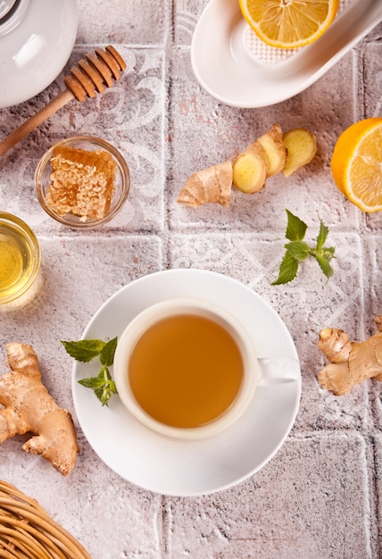Refreshing ginger tea with lemon, mint leaf and honey