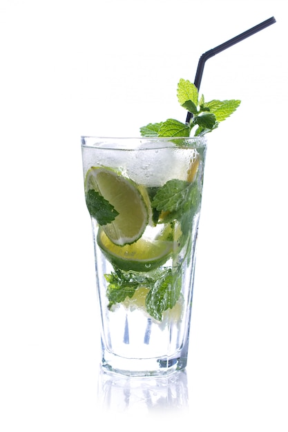 Refreshing glass of tradition Summer drink mojito with lime and mint isolated on white