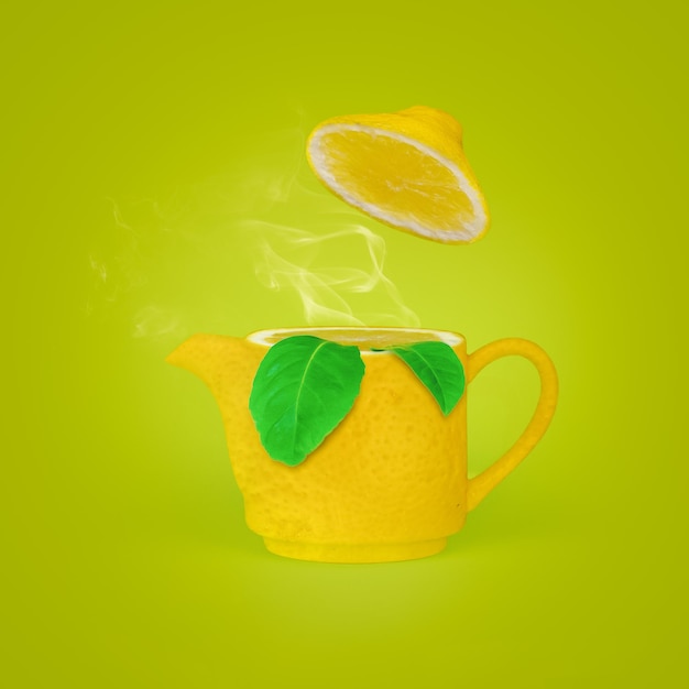 Refreshing lemon tea. tea concept with lemon teapot, tea leaves and steam. tea time concept.