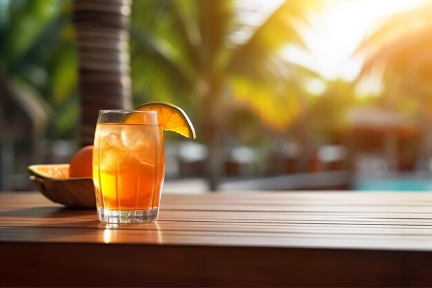 Photo refreshing orange drink by the pool at sunset