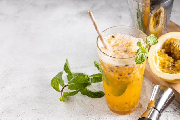 Refreshing passion fruit drink with mint and vodka