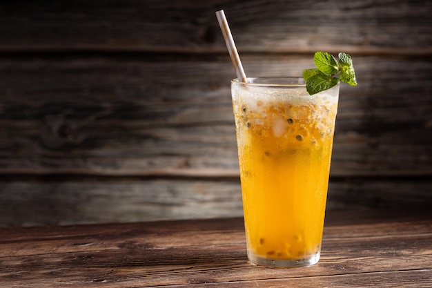 Refreshing passion fruit drink with mint and vodka