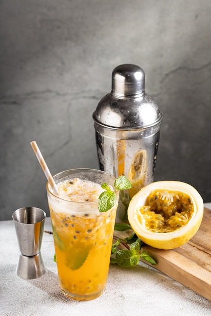 Refreshing passion fruit drink with mint and vodka