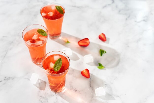 Refreshing summer drinks with strawberry.