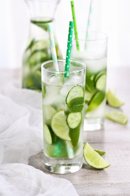 Refreshing tonic with slices of cucumber, mint, lime