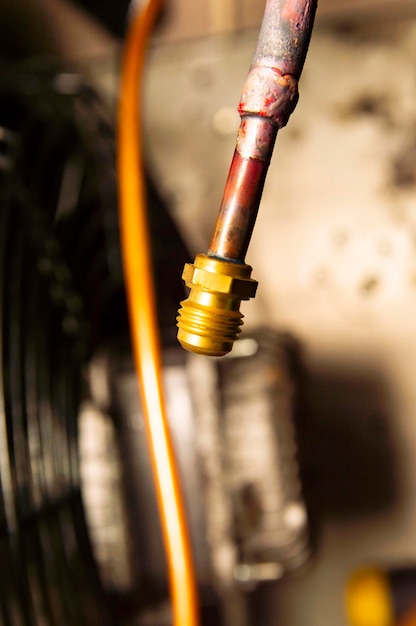 Refrigerator repair equipment and tools of a specialist in work