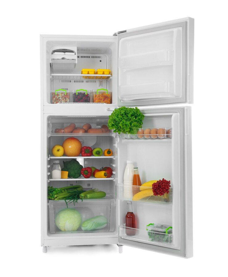Photo refrigerator with fresh products on white background