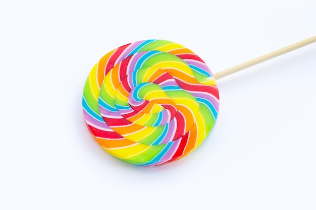 Regenboog lolly op witte achtergrond