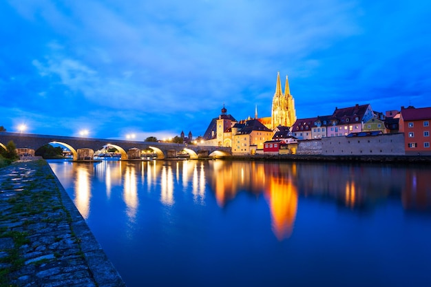 Regensburg cathedral or saint peter church near danube river at night regensburg is a city at danube river in bavaria germany