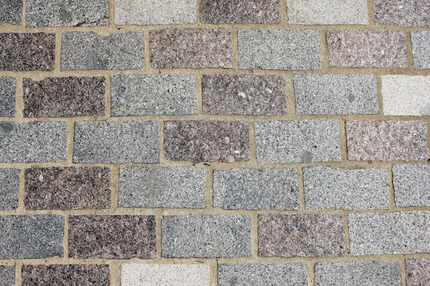 Regular street grey brick background composition