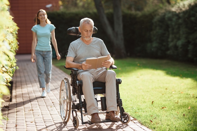 Rehab Invalid Man Reading Book Outdoors