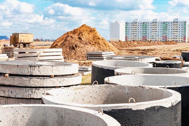 Reinforced concrete rings for the installation of underground wells at the construction site Reinforced concrete products for the device of underground communications Sewerage and plumbing