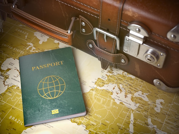 Reizen of toerisme concept Oude koffer met paspoort op de wereldkaart Vintage achtergrond