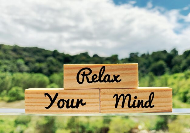 Photo relax your mind text on image with beautiful blurred background