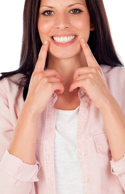 Relaxed brunette woman in the park showing her perfect smile