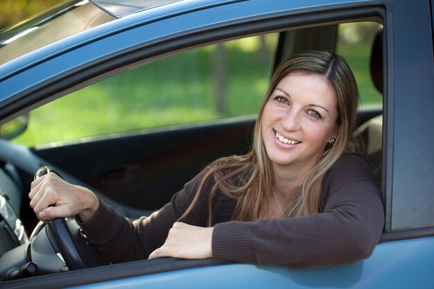 Leaning out of car