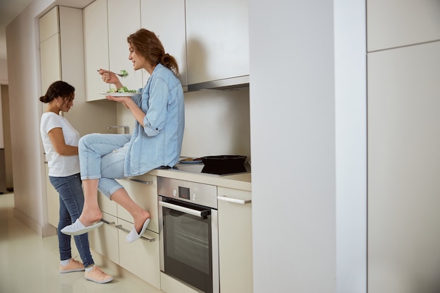 Relaxed female person sitting on the furniture