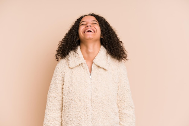 Relaxed and happy laughing neck stretched showing teeth