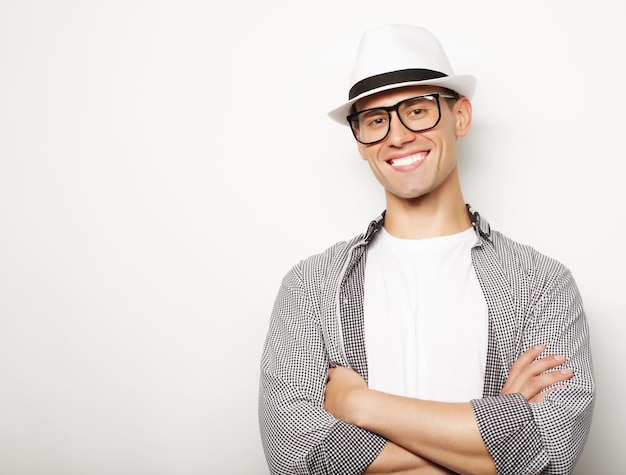 relaxed young casual man with hat