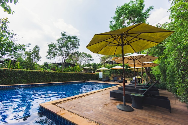 Relaxing area beside swimming pool