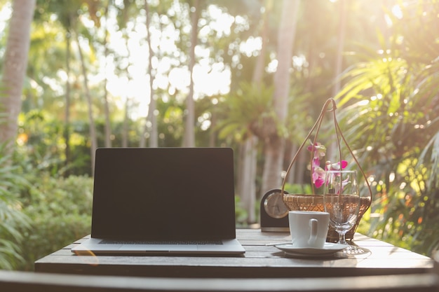 relaxing morning coffee and work on laptop 