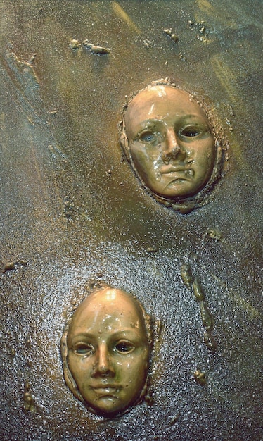 relief of a two man faces image