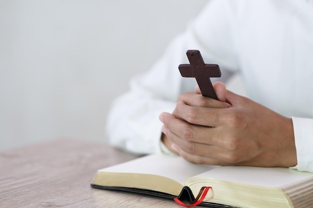 Religious young woman praying to god in the morning spirtuality and religion religious concepts