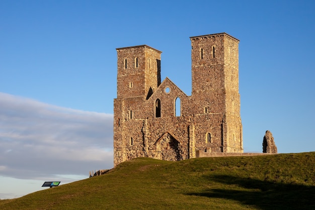 Remains of Reculver Church Towers Bathed in Late Afternoon Sun in Winter