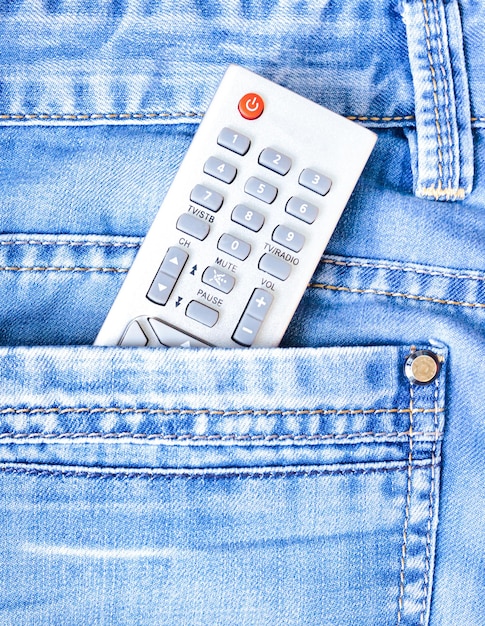 Remote control of the smart tv in the jeans pocket