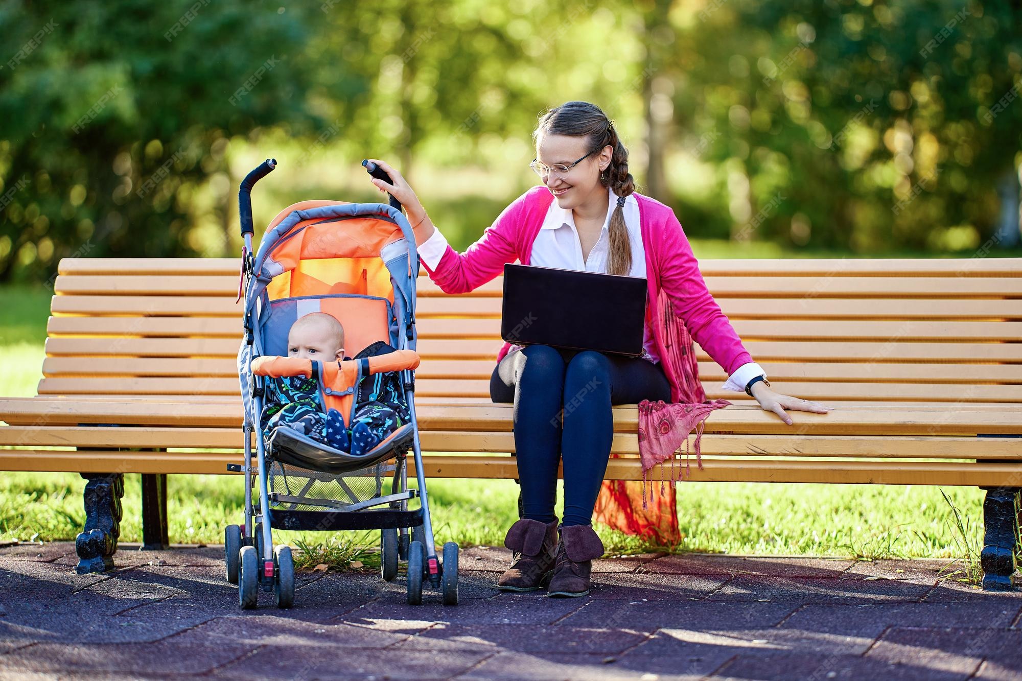 Premium Photo | Remote work on maternity leave mother took laptop for walk  with baby