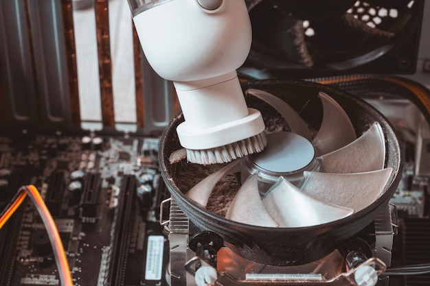 Removing dust from a computer with a vacuum cleaner