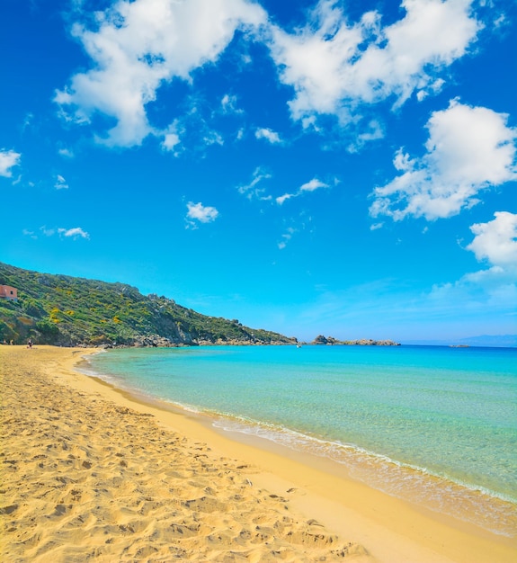 Rena bianca shore under white clouds Sardinia