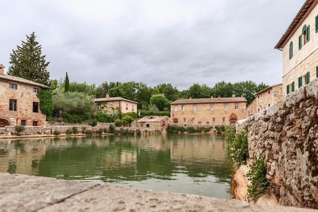 Renaissance era SPA complex Bagno Vignoni with a huge pool of hot spring mineral water Tuscany Italy