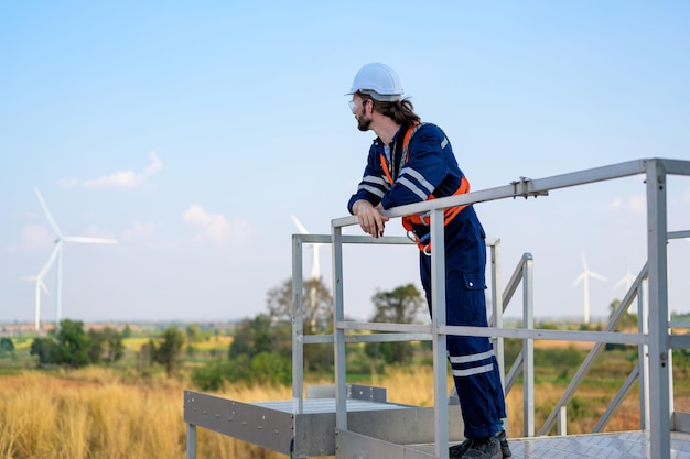 Renewable energy engineer working on wind turbine