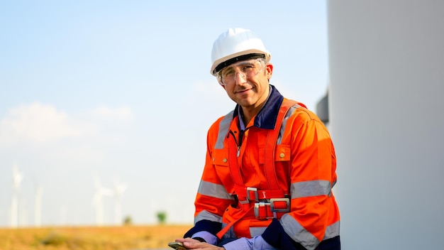 Renewable energy engineer working on wind turbine