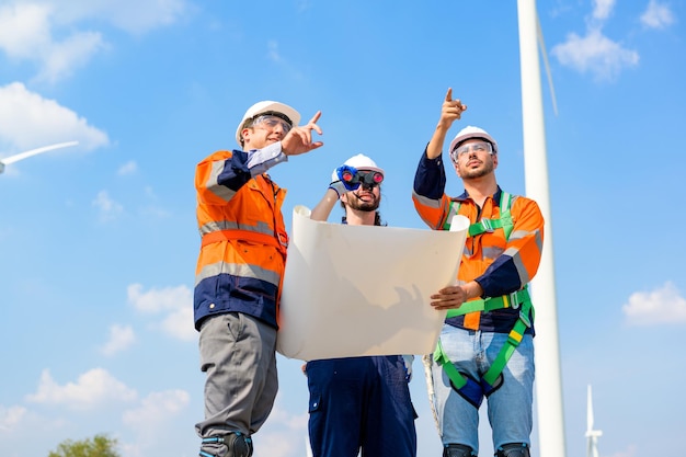 Photo renewable energy engineer working on wind turbine