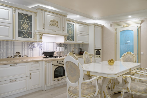 Renovated interior of rich classic white kitchen