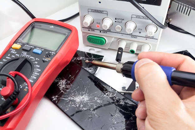 Repair of electronic devices, soldering of parts. Multimeter