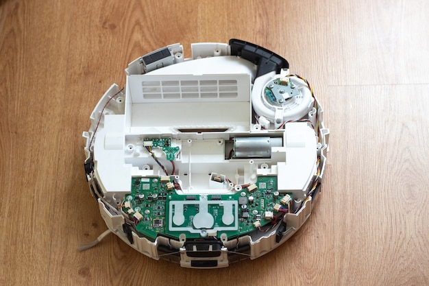 Repair of the robot vacuum cleaner disassembled robot\
vacuum