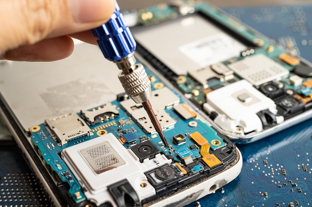 Repairing and upgrade mobile phone electronic computer hardware and technology concept