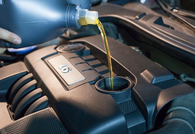 Replacement of engine oil in an engine at a car service center