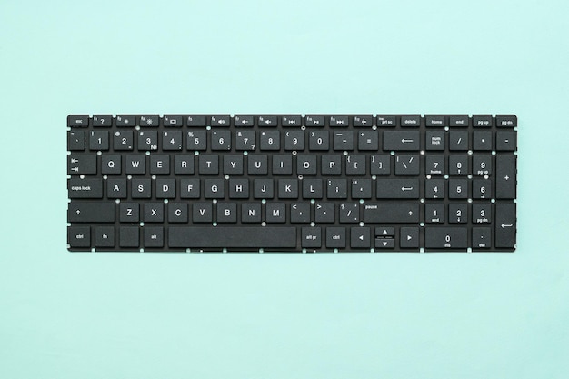 Replacement keyboard on laptops on a blue background