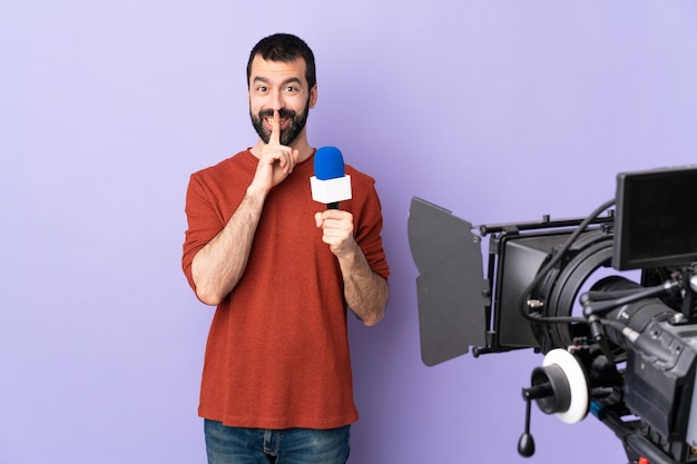 Reporter man over isolated purple background